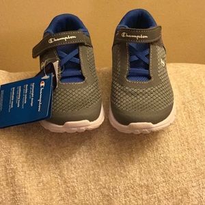 Champion shoes, Size 9.5, Brand new. Blue and Gray. With Stripes